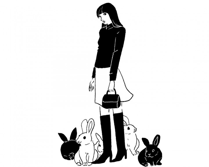 女性とウサギ