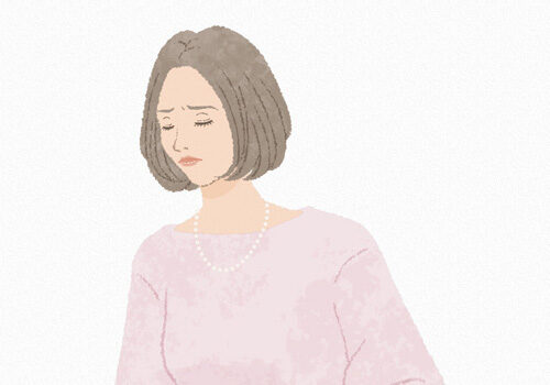 腹痛を起こす女性