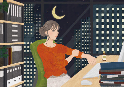 残業を頑張る女性